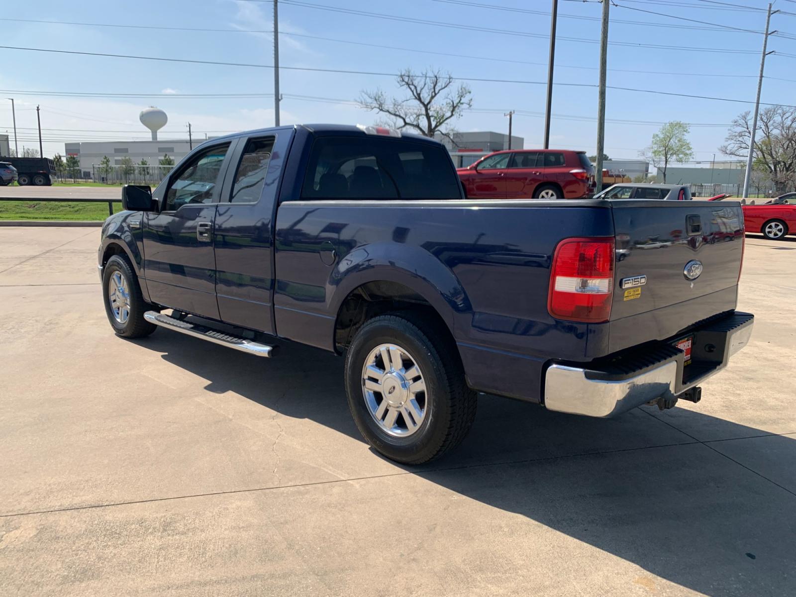 2008 BLUE /black Ford F-150 Lariat SuperCab 2WD (1FTPX12V48K) with an 5.4L V8 SOHC 24V FFV engine, 4-Speed Automatic Overdrive transmission, located at 14700 Tomball Parkway 249, Houston, TX, 77086, (281) 444-2200, 29.928619, -95.504074 - Photo #4